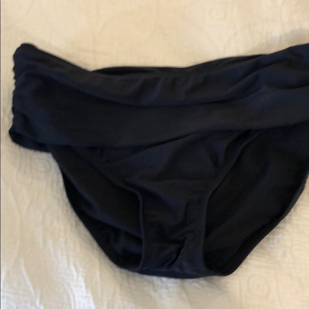 Black swimsuit bottoms.